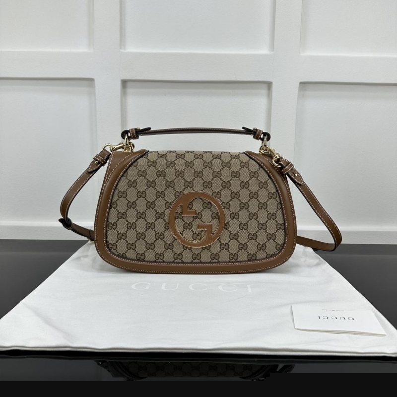 G*u*i top handle bags
